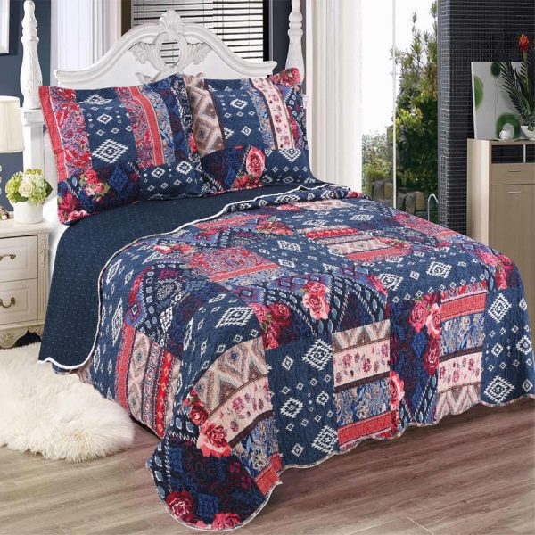 blue patchwork quilted bedcover