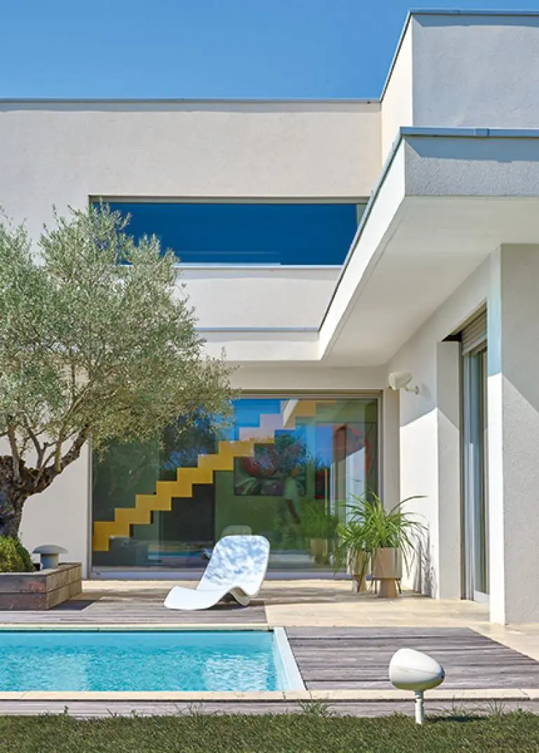 Focal Littora outdoor speakers positioned beside a residence pool and terrace